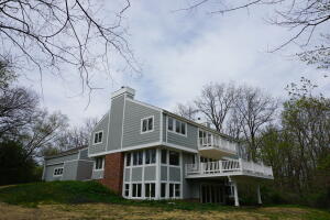 Pond home for sale at 2140  Rivershore Dr in Mount Pleasant Wisconsin