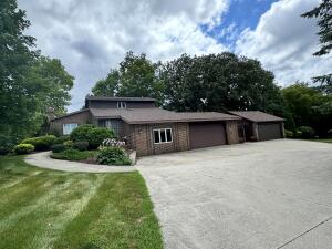 Milwaukee River home for sale at 1555  River Bend Rd in Grafton Wisconsin