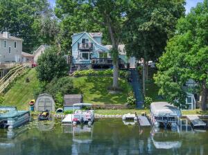 Okauchee Lake home for sale at W351N5316  Road C - in Oconomowoc Wisconsin