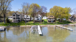 BIG CEDAR LAKE home for sale at 5656 W Lake Dr in West Bend Wisconsin