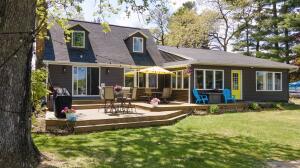 Bughs Lake home for sale at W7660  State Road 21 and 73 - in Dakota Wisconsin