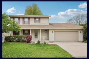 Little Spring Lake home for sale at 1212 N Glenwood Cir in West Bend Wisconsin