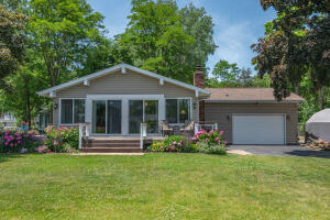 Lower Springs Lake home for sale at 299  Shore Dr in Palmyra Wisconsin