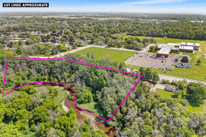 Manitwowoc River home for sale at 1202 N Rapids Rd in Manitowoc Wisconsin