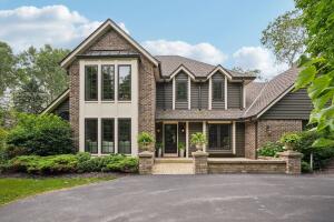 Private Pond home for sale at 1385 E Sauk Rd in Grafton Wisconsin