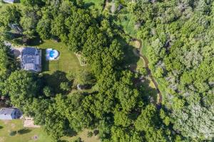 Creek home for sale at W220N5784  Town Line Rd in Menomonee Falls Wisconsin