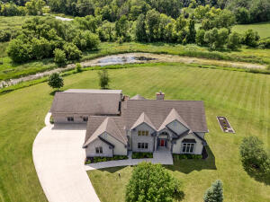 pond home for sale at 3976  Woodridge Ct in Richfield Wisconsin
