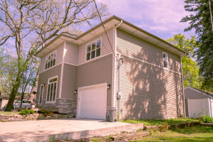 Pewaukee Lake home for sale at N21W29727  Glen Cove Rd in Delafield Wisconsin