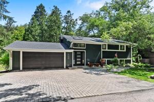 On Stream home for sale at 350 S Lower Gardens Rd in Fontana Wisconsin