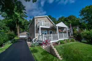 Big Cedar home for sale at 4929  State Highway 144 - in West Bend Wisconsin