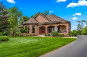 Lac La Belle home for sale at 180  Monastery Hill Dr in Lac La Belle Wisconsin