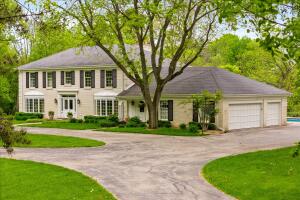 Stark Pond home for sale at 8704 W Bonniwell Rd in Mequon Wisconsin