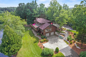 Big Cedar Lake home for sale at 6215  Riesch Rd in West Bend Wisconsin