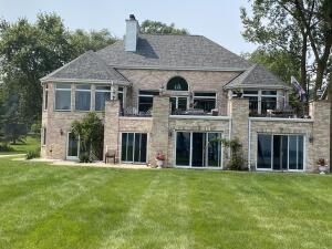 Pewaukee Lake home for sale at W304N2470  Maple Ave in Delafield Wisconsin
