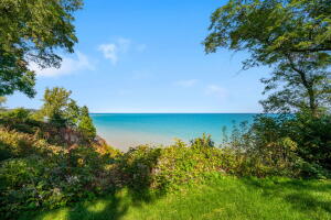 Lake Michigan home for sale at 9604 N Lake Dr in Bayside Wisconsin