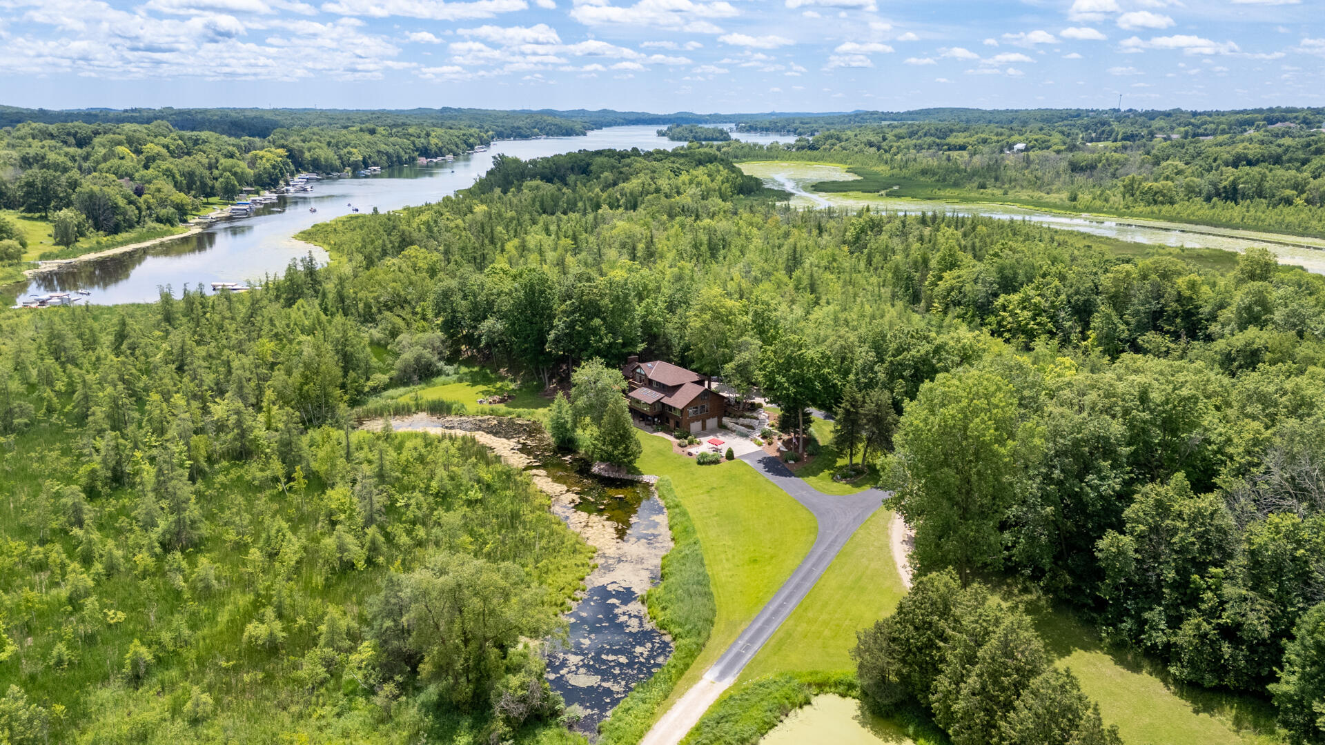 Wisconsin Lake Home for sale (MLS#: 1881663) at 6215  Reisch Rd, in West Bend, Wisconsin. (1 of 52)