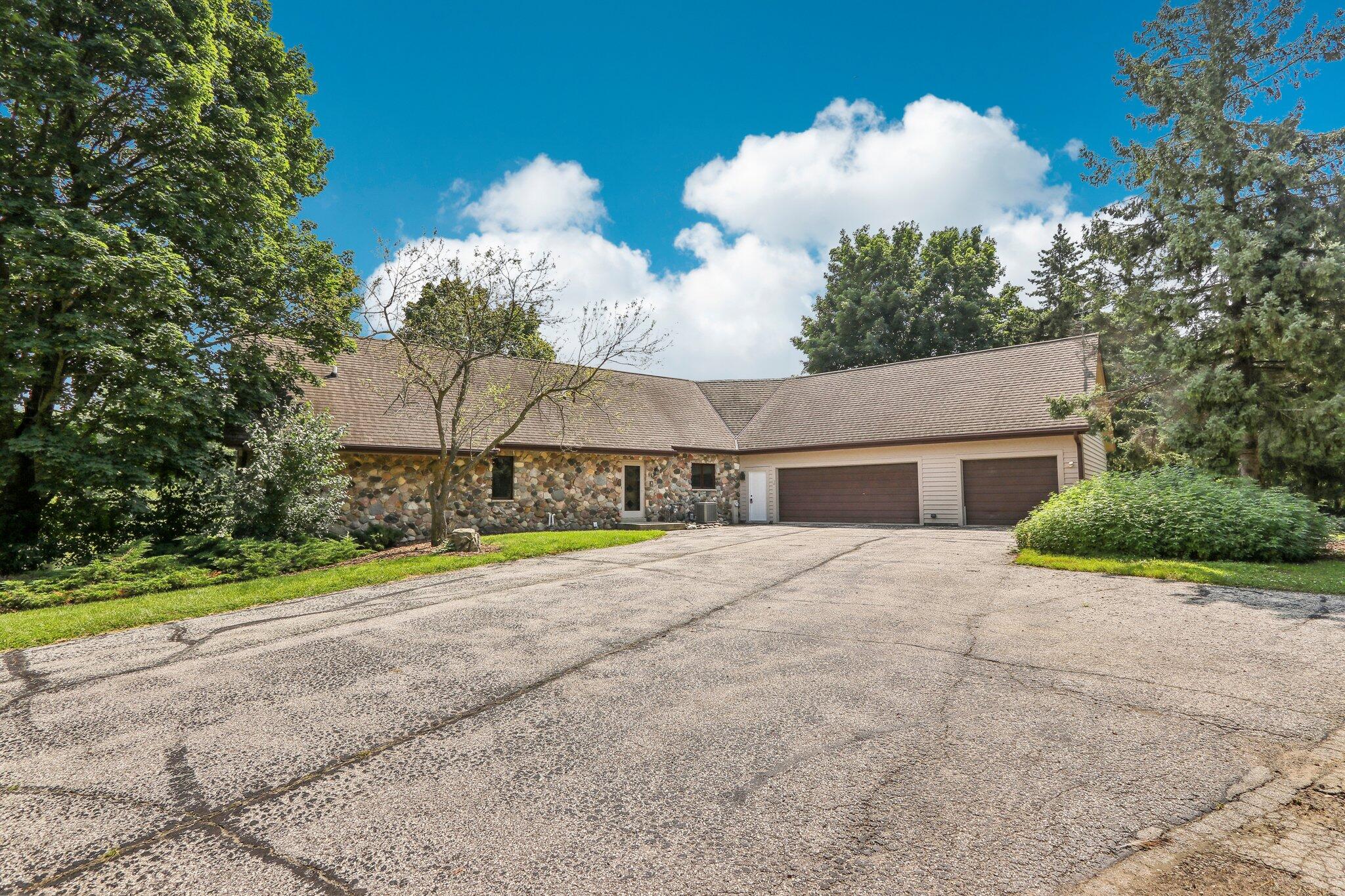 Wisconsin Lake Home for sale (MLS#: 1886425) at W220N1169  Springdale Rd, in Pewaukee, Wisconsin. (1 of 51)