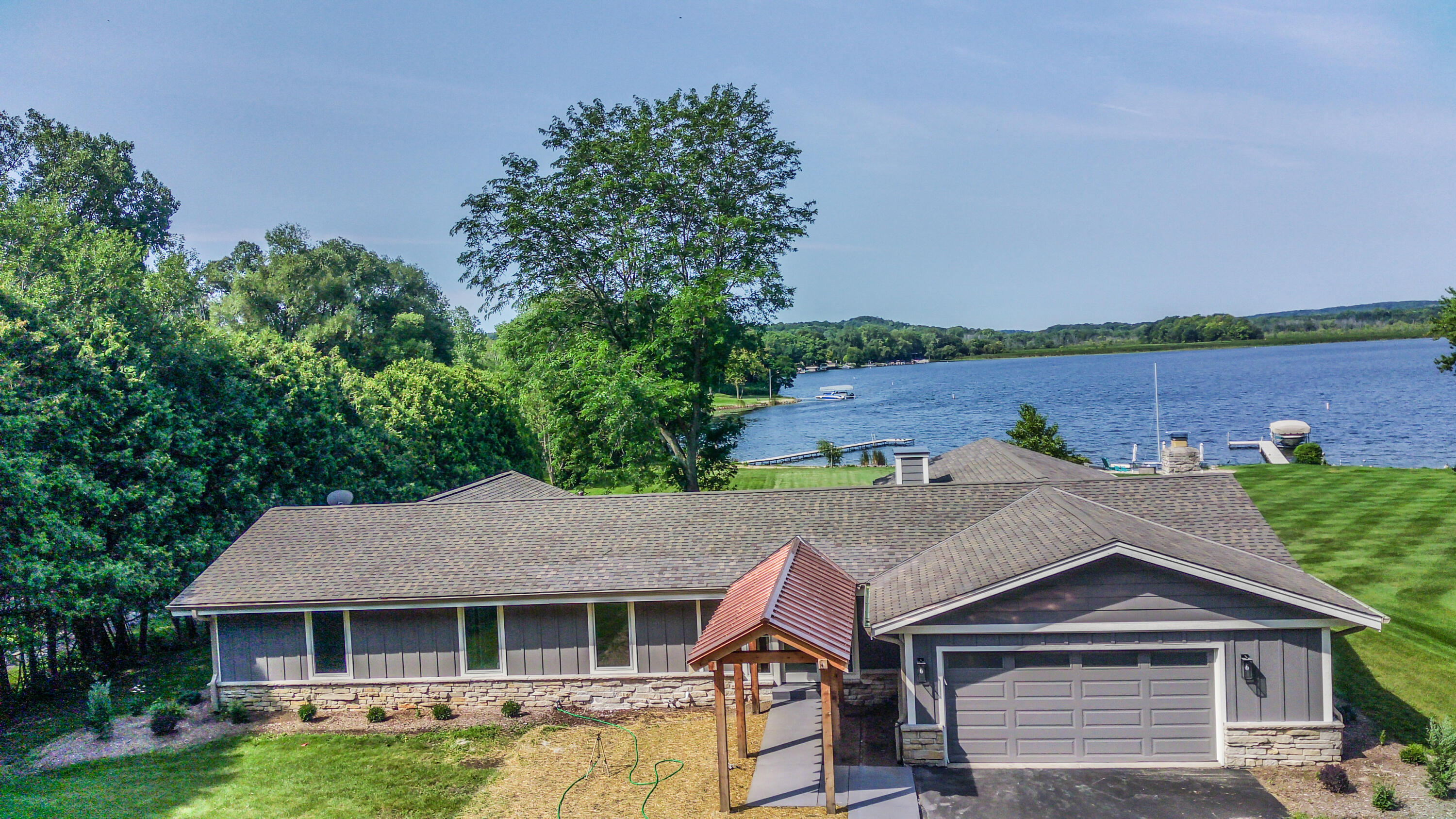 Wisconsin Lake Home for sale (MLS#: 1888976) at 5221  Little Cedar Ln, in West Bend, Wisconsin. (2 of 36)