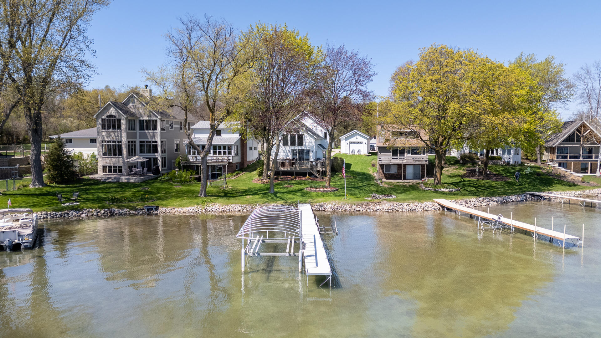 Wisconsin Lake Home for sale (MLS#: 1917393) at 5656 W Lake Dr, in West Bend, Wisconsin. (1 of 39)