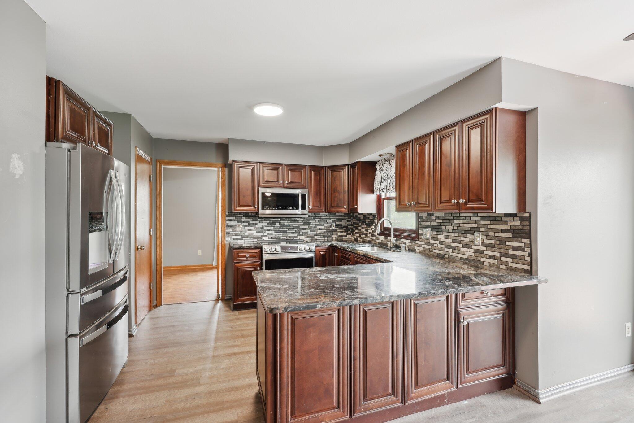 Wisconsin Lake Home for sale (MLS#: 1918323) at 1212 N Glenwood Cir, in West Bend, Wisconsin. (8 of 40)