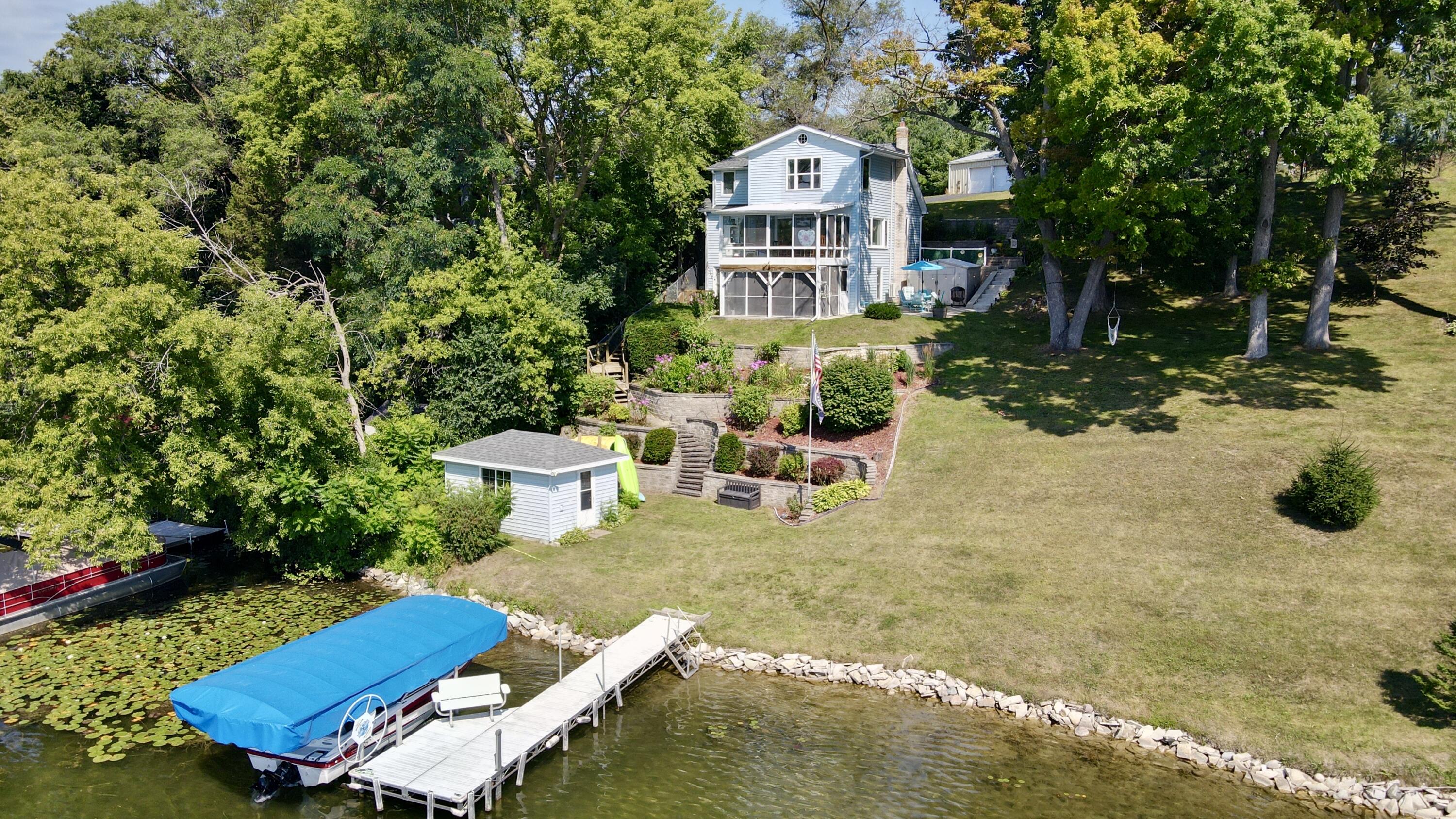 Wisconsin Lake Home for sale (MLS#: 1931670) at 7184  Pleasant Dr, in West Bend, Wisconsin. (1 of 54)